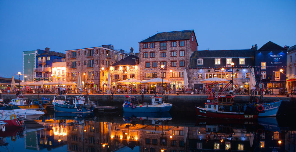 Old buildings at night lit up