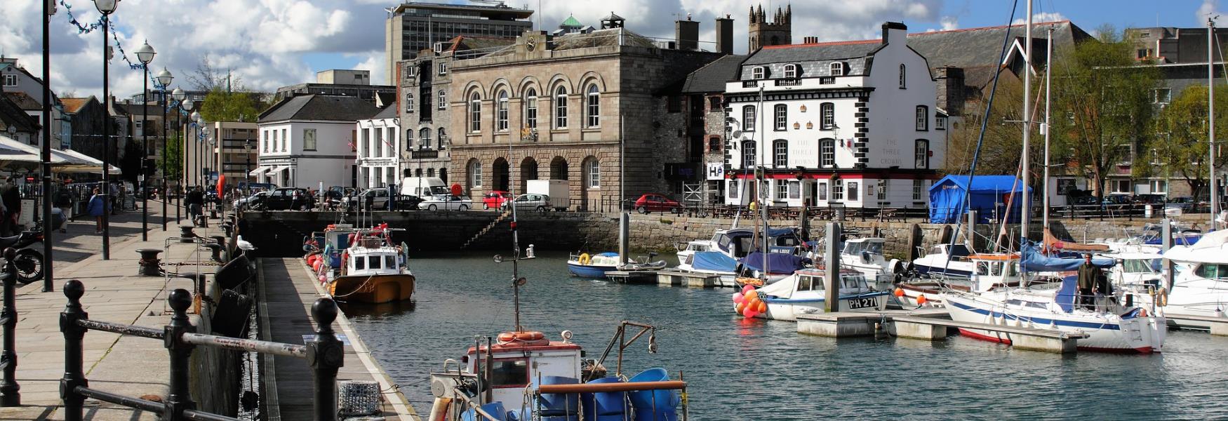 Boats in water on The Barbican