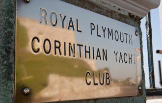 The name plaque outside the entrance to the Royal Plymouth Corinthian Yacht Club